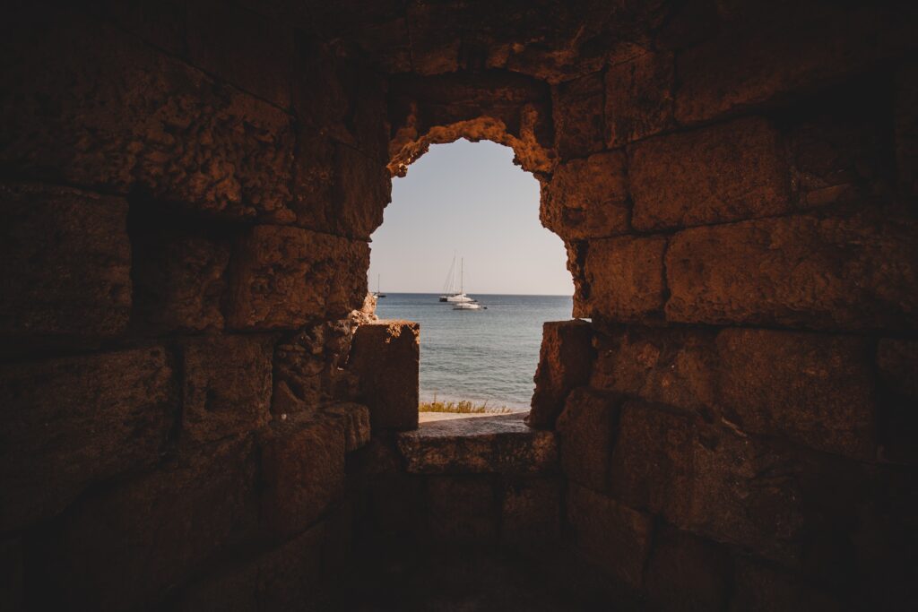 A view of the sea from a small window from the Alanya castle